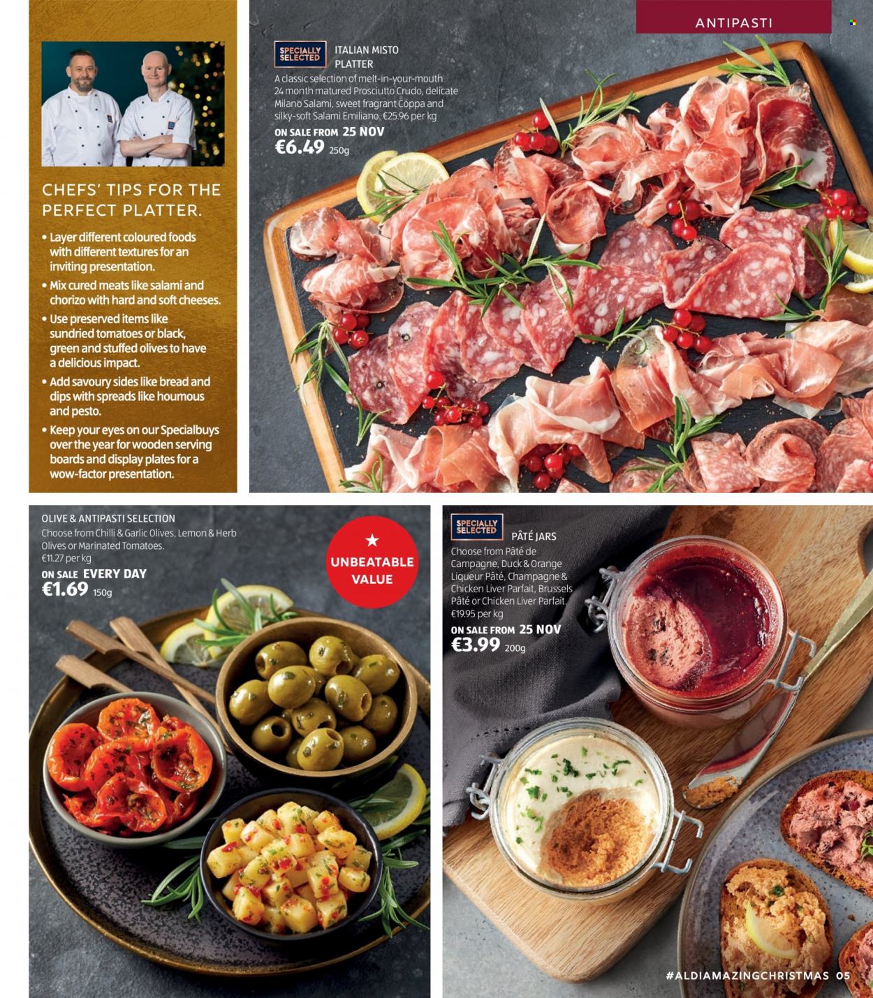Aldi offer  - Sales products - bread, tomatoes, salami, prosciutto, chorizo, houmous, cheese, sun dried tomatoes, olives, pesto, liqueur, chicken meat, plate, platter, jar. Page 5.